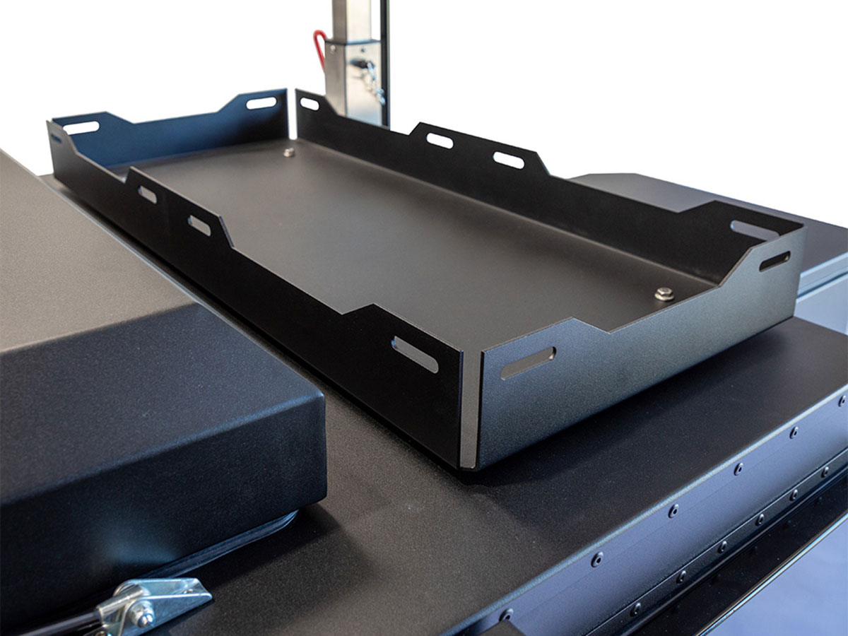 INTEGRATED TOP STORAGE TRAY